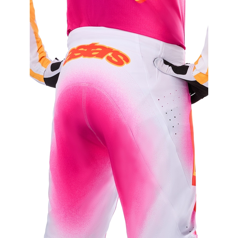 Motokrosové nohavice Alpinestars Supertech limitovaná edícia MIG fluo ružovo-bielo-oranžové