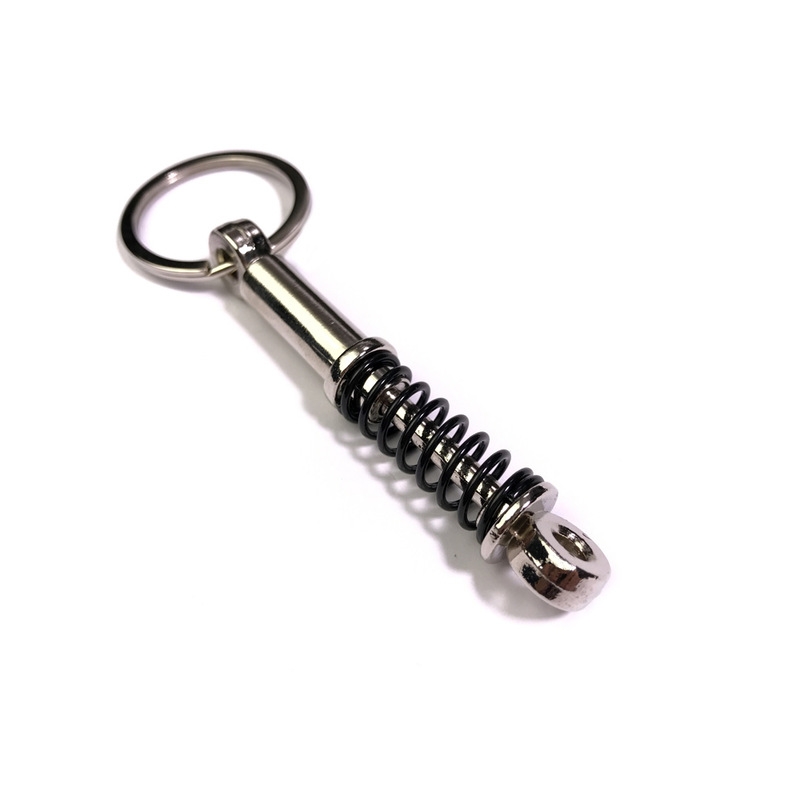 Prívesok na kľúče Tlmič