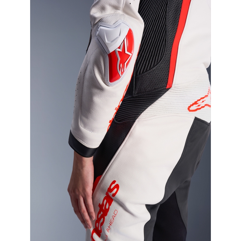 Dámska jednodielna kožená kombinéza na motorku Alpinestars Stella GP-R7 bielo-fluo červeno-čierna