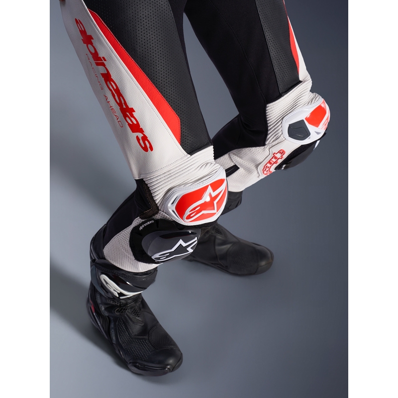 Dámska jednodielna kožená kombinéza na motorku Alpinestars Stella GP-R7 bielo-fluo červeno-čierna